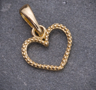 Dije silueta de corazon 0.5gr / Largo 1.4cm / Oro Amarillo Nac M