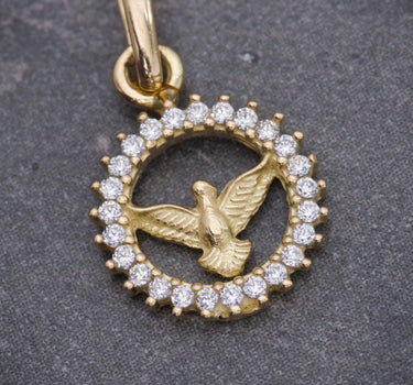 Dije espiritu santo con swarovski blanco 0.9gr / Largo 1.8cm / Oro Amarillo Nac P