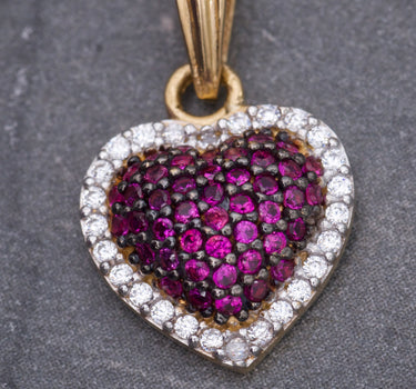 Dije corazon con swarovski fucsia 1.7gr / Largo 1.9cm / Oro Amarillo Nac M