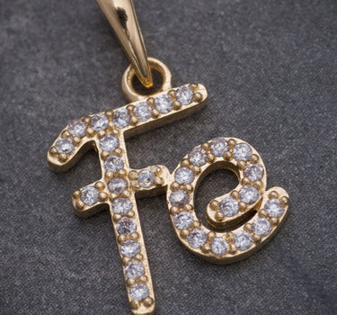 Dije fe con swarovski blanco 1.4gr / Largo 2cm / Oro Amarillo Nac M