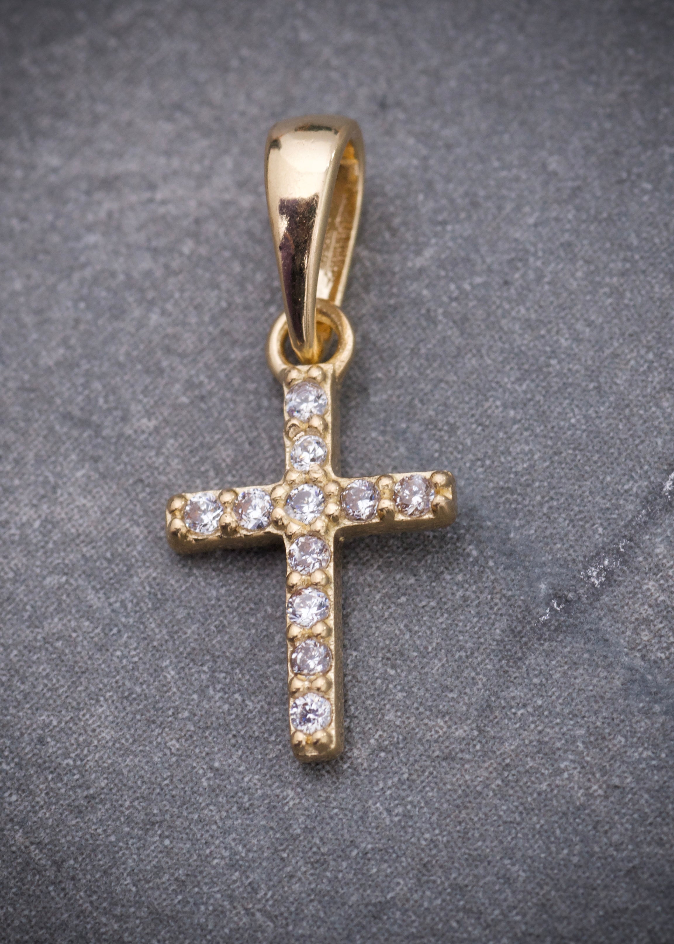 Dije cruz con swarovski blanco 0.6gr / Largo 1.7cm / Oro Amarillo Nac P