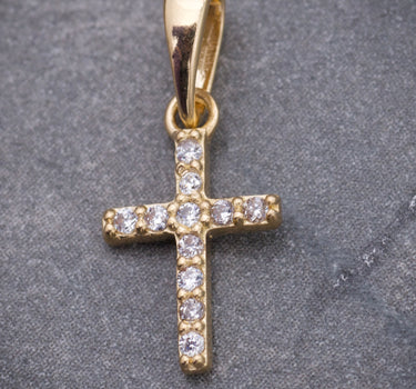 Dije cruz con swarovski blanco 0.6gr / Largo 1.7cm / Oro Amarillo Nac P