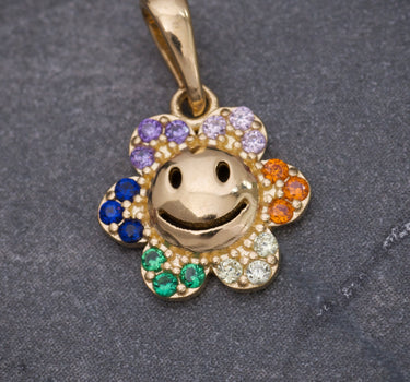 Dije flor con swarovski multicolor 1gr / Largo 1.6cm / Oro Amarillo Nac M