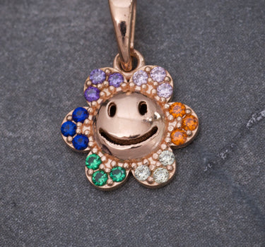 Dije flor con swarovski multicolor 0.95gr / Largo 1.6cm / Oro Rosado Nac M