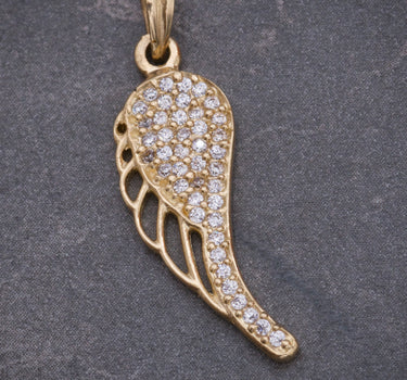 Dije ala con swarovski blanco 1.6gr / Largo 2.7cm / Oro Amarillo Nac P
