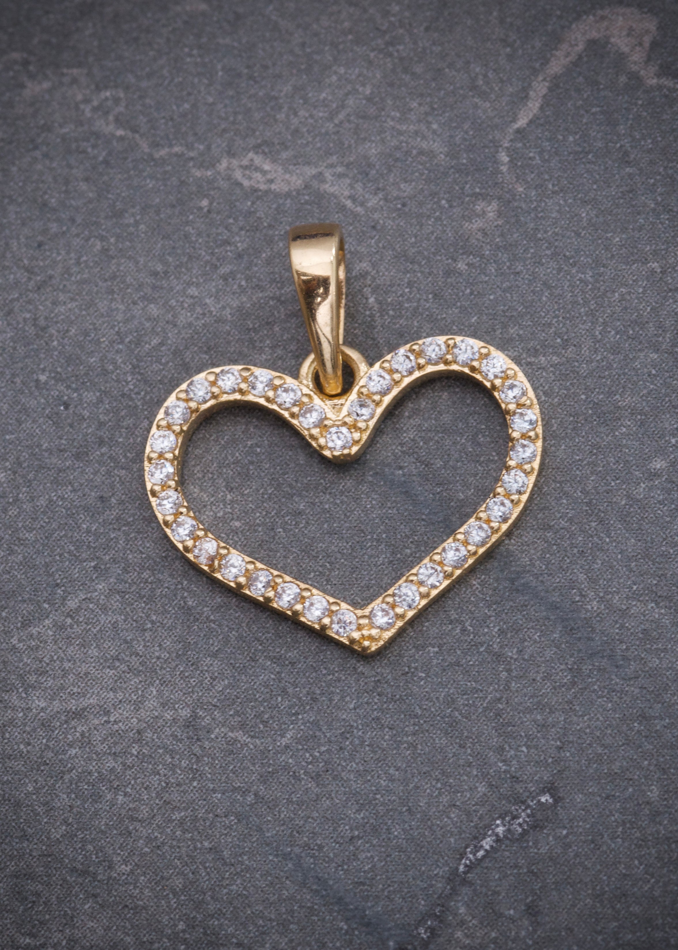Dije corazon con swarovski blanco 1.1gr / Largo 1.8cm / Oro Amarillo Nac P