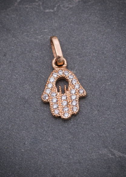 Dije mano hs con swarovski blanco 0.7gr / Largo 1.6cm / Oro Rosado Nac*