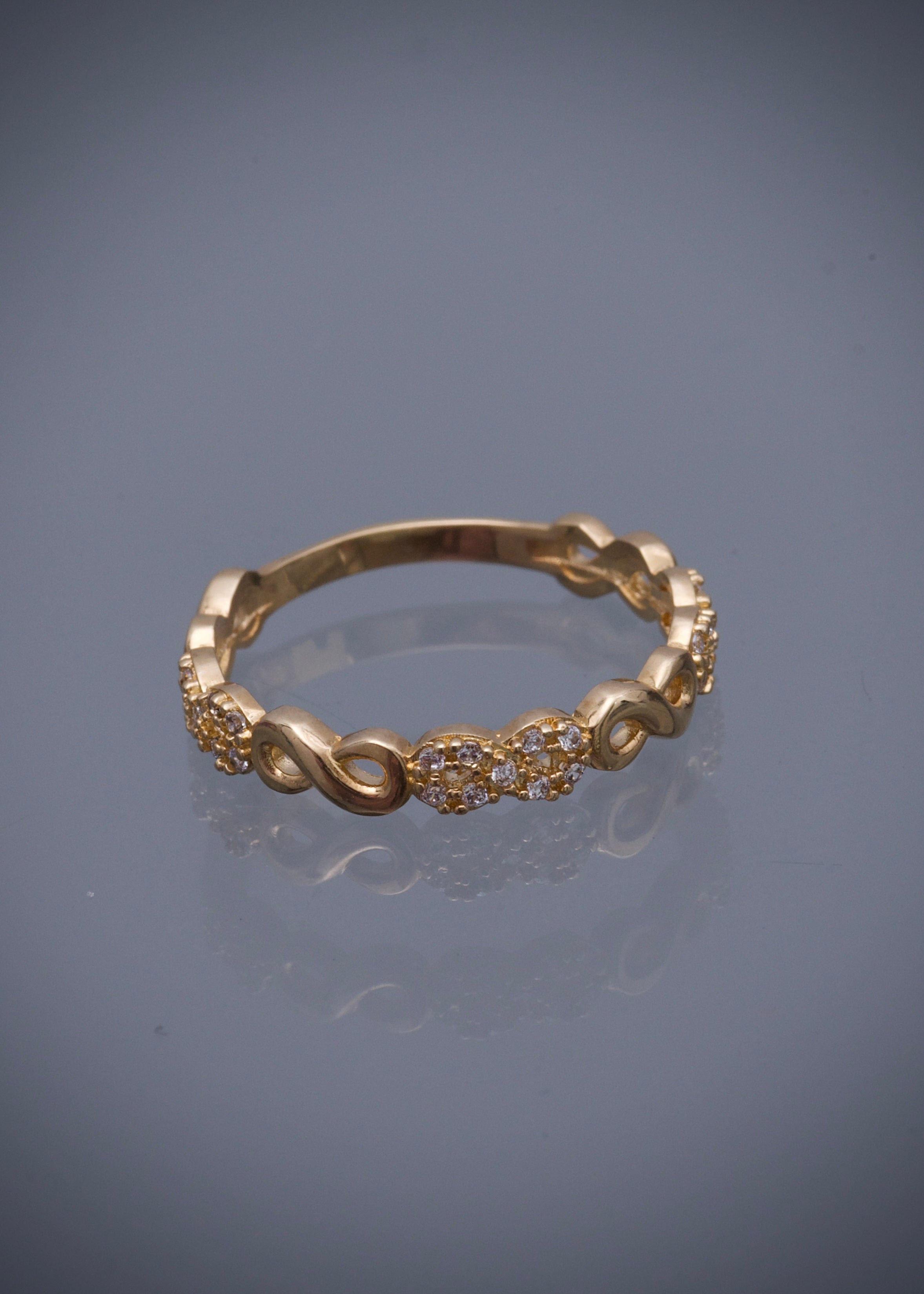 Anillo infinito con swarovski blanco 2.3gr / TALLA 5 3/4 / Oro Amarillo Nac B