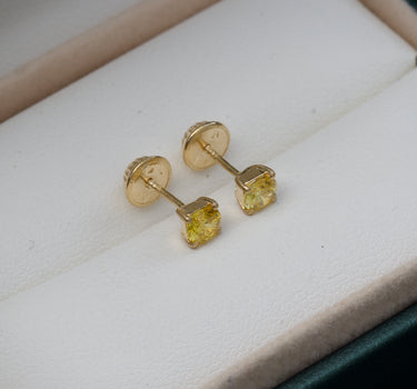 Topos con swarovski amarillo 0.9gr / 0.4cm / Oro Amarillo Nac M