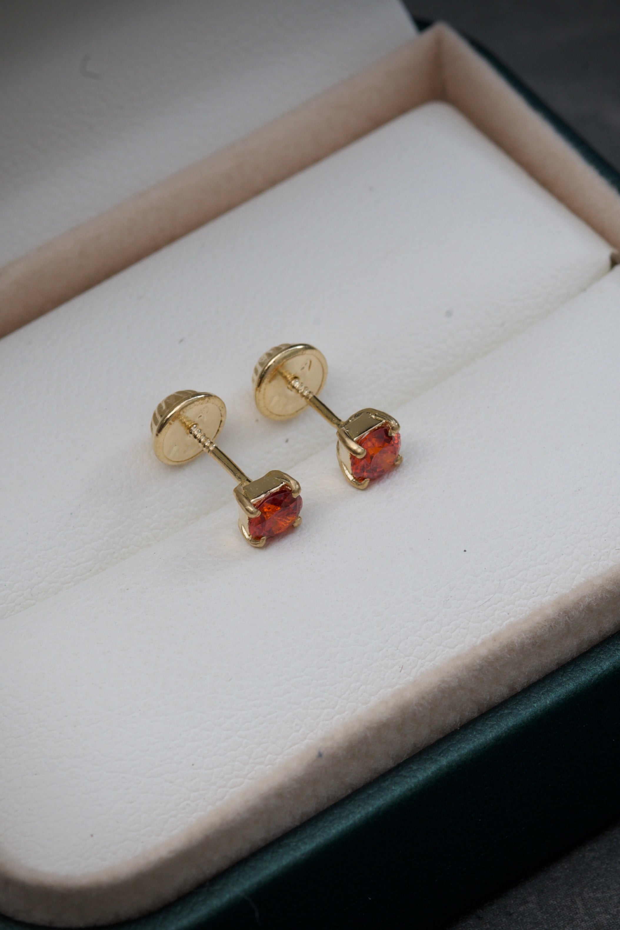 Topos con swarovski naranjado 0.9gr / 0.4cm / Oro Amarillo Nac B