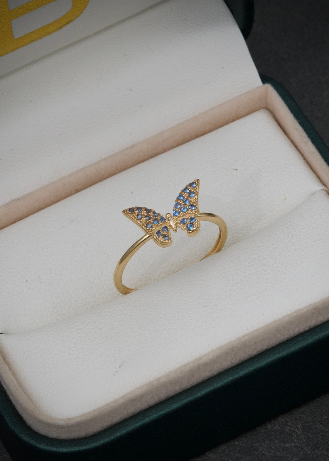 Anillo mariposa con swarovski azul 1.8gr / Talla 8 — Oro Amarillo