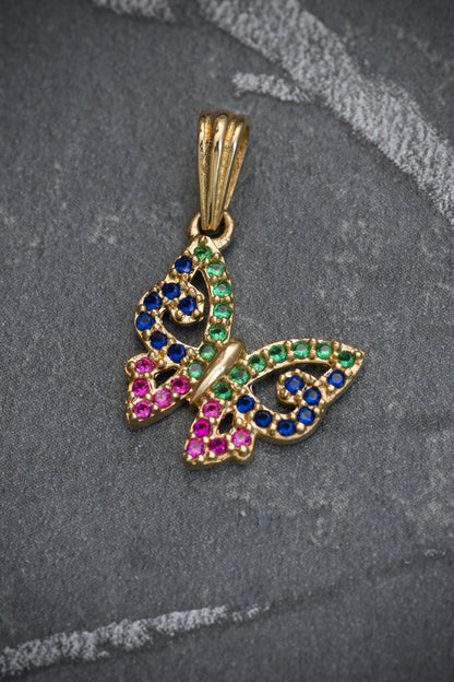 Dije de mariposa con swarovski multicolor 1.35gr / 2cm / Oro Amarillo Nac M