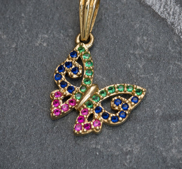 Dije de mariposa con swarovski multicolor 1.35gr / 2cm / Oro Amarillo Nac M