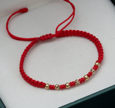 Pulsera en hilo rojo con bolas lisas y diamantadas 3mm 0.35gr / Dos Oros (Joya) M