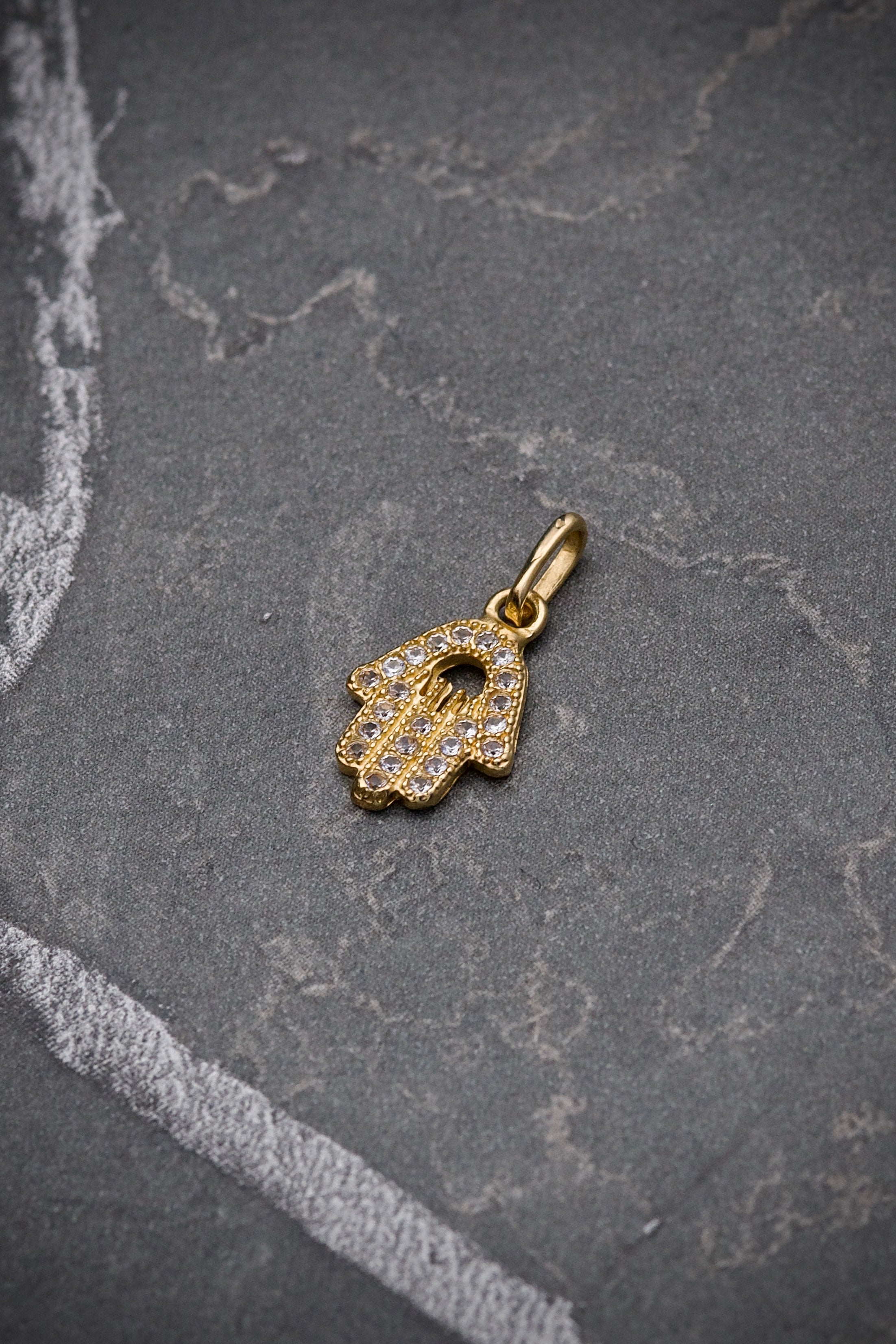 Dije de mano HS 0.8gr / 2cm / Oro Amarillo Nac B