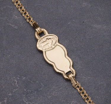 Pulso bebe con placa san benito 1.35gr / Largo 13.5cm / Oro Amarillo Nac M