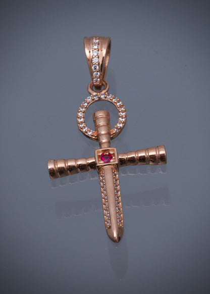 Dije cruz con swarovski blanco y fucsia 3.45gr / Largo 4.3cm / Oro Rosado Nac B