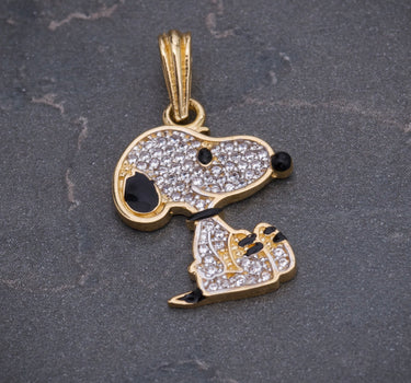 Dije snoopy con swarovksi blanco 1.9gr / Largo 2.4cm / Oro Amarillo Nac B