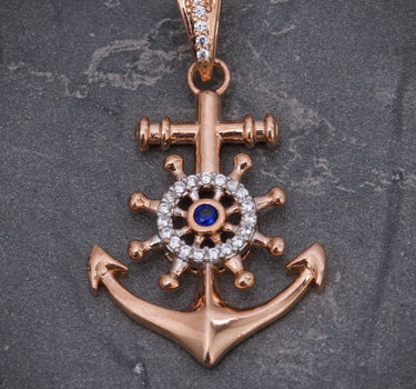Dije ancla con swarovski azul y blanco 4.05gr / Largo 4.3cm / Oro Rosado Nac M