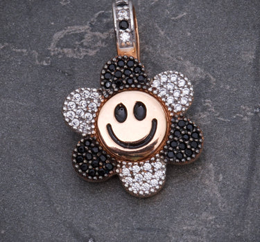 Dije flor giratorio swarovski negro y blanco 4.35gr / Largo 2.5cm / Oro Rosado Nac M