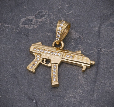 Dije ak 47 con swarovski blanco 2.3gr / Largo 2.3cm / Oro Amarillo Nac M