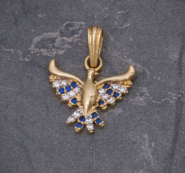 Dije ave fenix con swarovski azul y blanco 1.7gr / Largo 2cm / Oro Amarillo Nac M