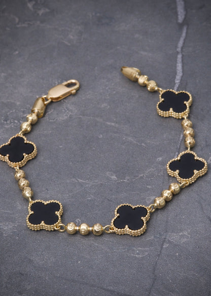 Pulso lucky clover con piedra negra 11.85gr / Largo 18cm / Oro Amarillo Nac B