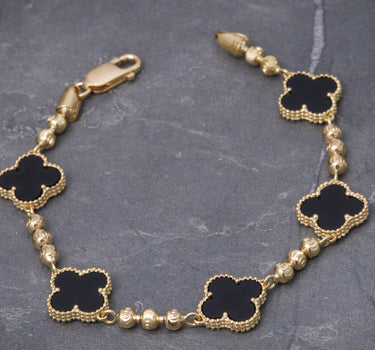 Pulso lucky clover piedra negra 13.05gr / Largo 20cm / Oro Amarillo Nac B
