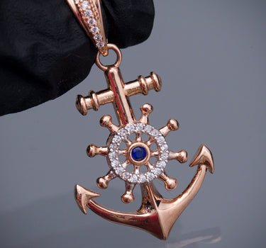Dije ancla con swarovski azul y blanco 4.05gr / Largo 4.3cm / Oro Rosado Nac M