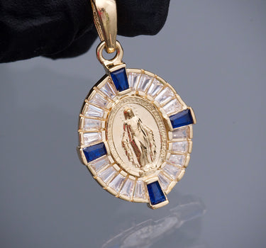 Dije virgen milagrosa swarovski azul y blanco 2.6gr / Largo 2.8cm / Oro Amarillo Nac M