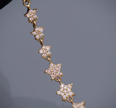 Dije estrellas con swarovski blanco 2.85gr / Largo 7.7cm / Oro Amarillo Nac M