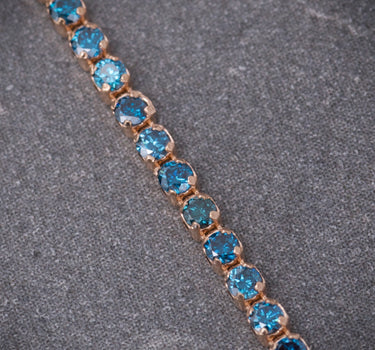 Pulso tenis con 113pts de diamantes azules 1.95gr / Largo 18cm / Oro Rosado (Joya) B