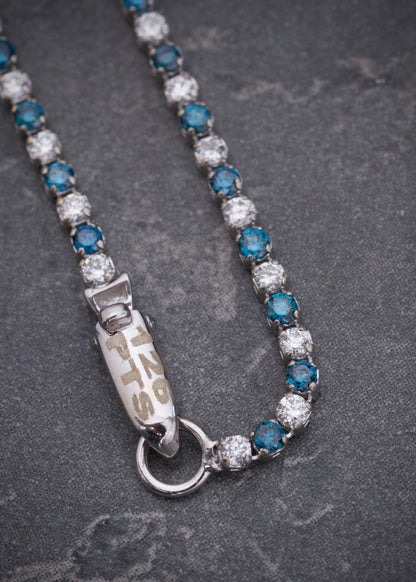 Pulso tenis con 126pts de diamantes azules y blancos 2.05gr / Largo 17.5cm / Oro Blanco (Joya) M