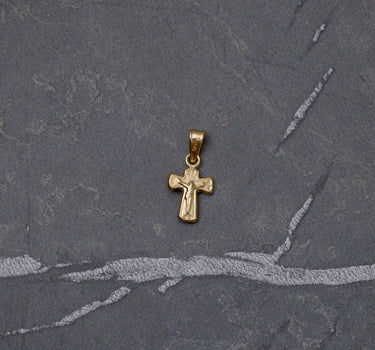 Dije de cruz jesus con relieve 0.35gr / Largo 1.7cm / Oro Amarillo Nac M