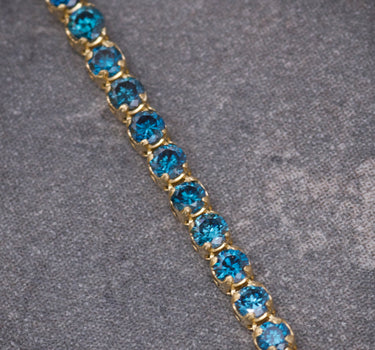 Pulso tenis con 126pts de diamantes azules 2.05gr / Largo 18cm / Oro Amarillo (Joya) B