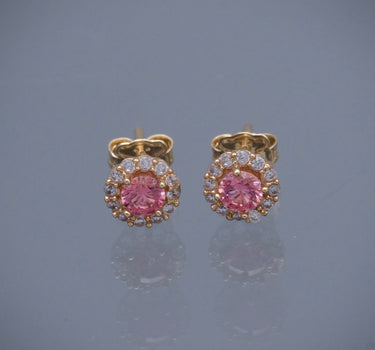 Topos flor con swarovski rosado y blanco 2.2gr / Largo 0.7cm / Oro Amarillo Nac P