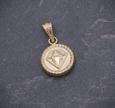 Dije diamante 0.6gr / Largo 1.7cm / Oro Amarillo Nac P