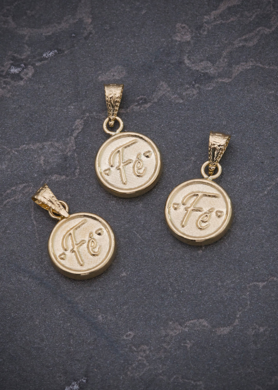 Dije fe 0.5gr / Largo 1.5cm — Oro Amarillo