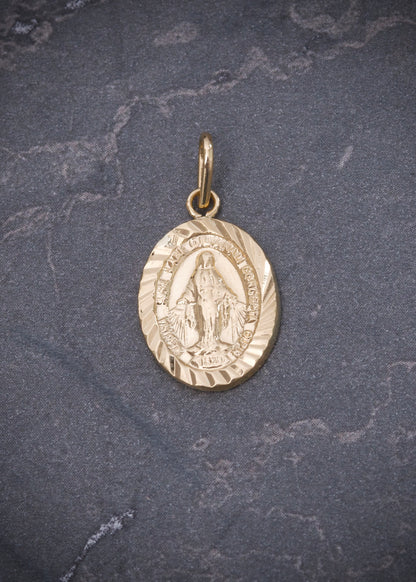Dije virgen de la milagrosa 0.85gr / Largo 2.2cm / Oro Amarillo Nac M