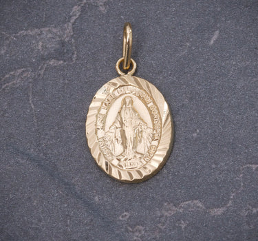 Dije virgen de la milagrosa 0.9gr / Largo 2.2cm / Oro Amarillo Nac B