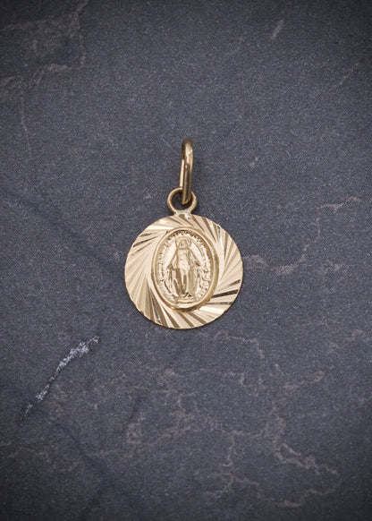 Dije Virgen de la milagrosa 0.85gr / Largo 1.8cm / Oro Amarillo Nac M