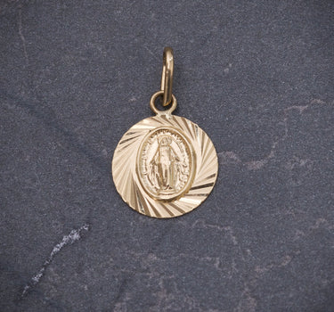 Dije Virgen de la milagrosa 0.85gr / Largo 1.8cm / Oro Amarillo Nac M