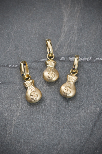 Dije bolsa de dinero 0.3gr / Largo 1.5cm / Oro Amarillo Nac B