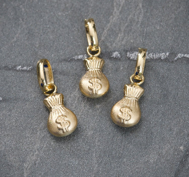 Dije bolsa de dinero 0.3gr / Largo 1.5cm / Oro Amarillo Nac M