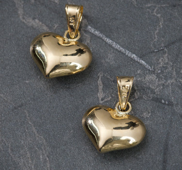 Dije corazon liso 0.5gr / Largo 1.5cm / Oro Amarillo Nac B