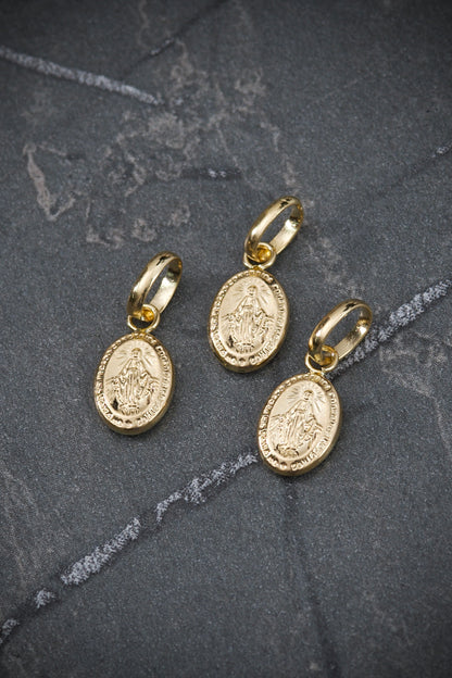 Dije virgen milagrosa 0.3gr / Largo 1.5cm / Oro Amarillo Nac B