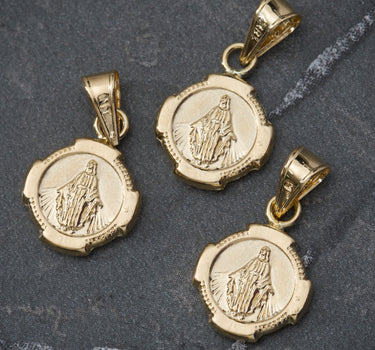 Dije virgen milagrosa 0.45gr / Largo 1.7cm / Oro Amarillo Nac B