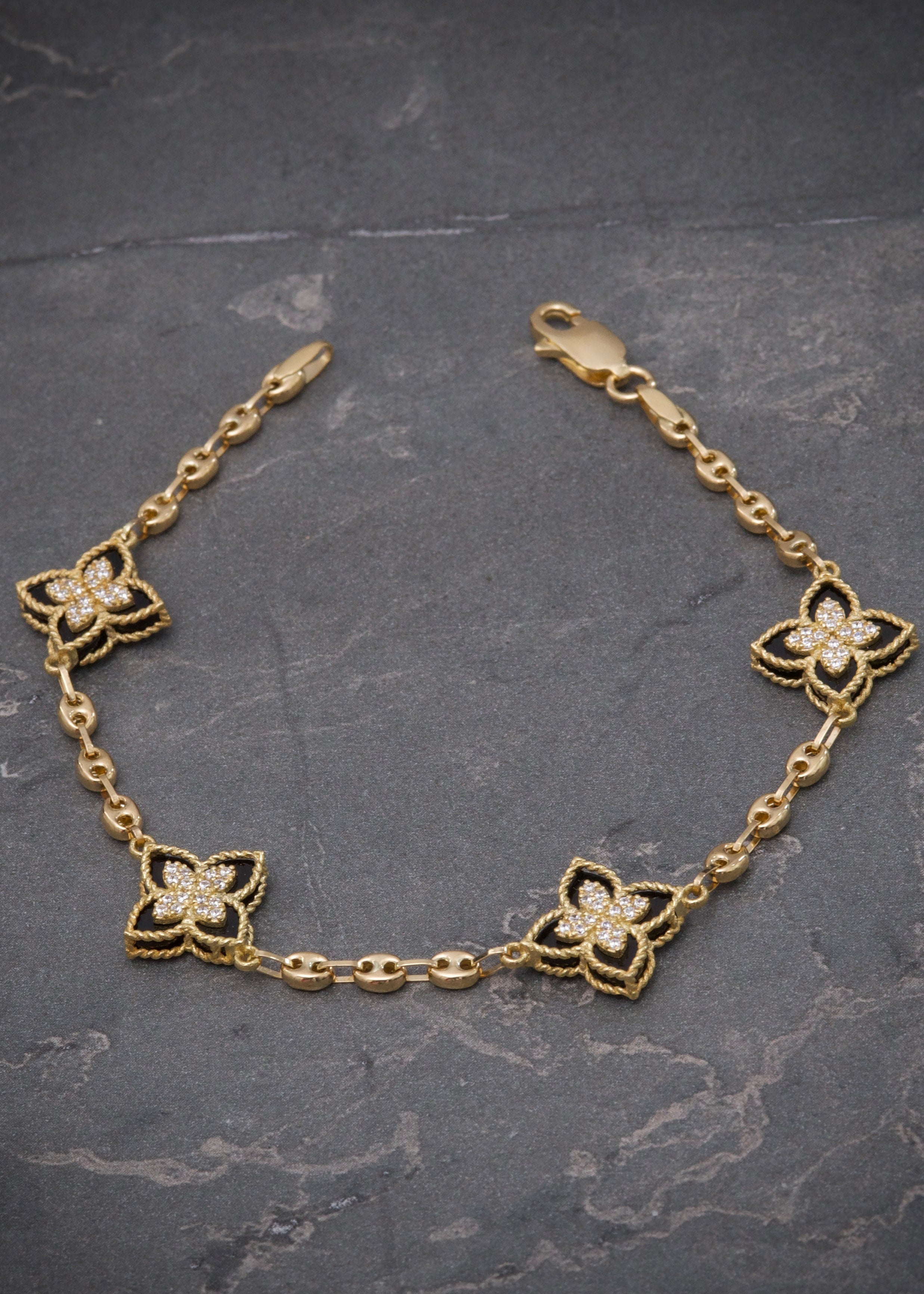Pulso lucky clover piedra negra 6.75gr / Largo 19cm / Oro Amarillo Nac P
