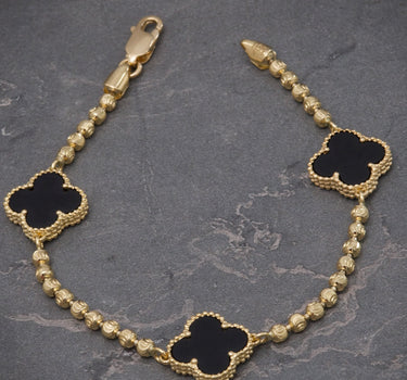 Pulso lucky clover piedra negra 9.3gr / Largo 18cm / Oro Amarillo Nac B