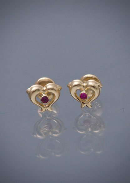Topos delfines con swarovski fucsia 0.55gr / Largo 0.7cm / Oro Amarillo Nac M